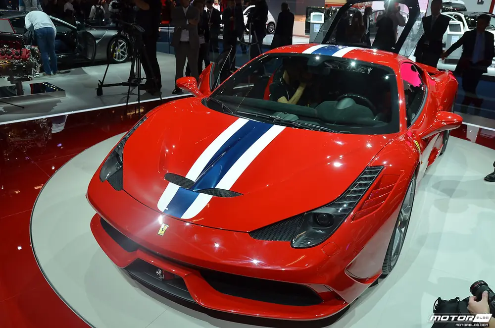 Red supercar on an open road near Maranello